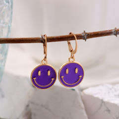 Enamel smile face huggie earrings