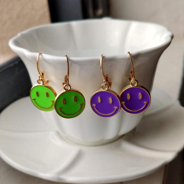 Enamel smile face huggie earrings