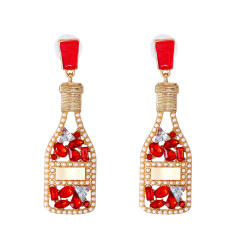 Champagne wine bottle full of rhinestone dangle earrings