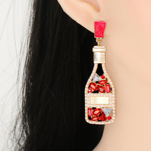Champagne wine bottle full of rhinestone dangle earrings