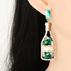 Champagne wine bottle full of rhinestone dangle earrings