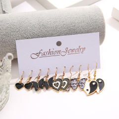Black color heart butterfly taichi earrign set