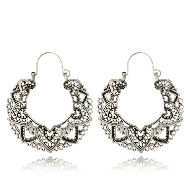 Vintage hollow Totem hoop earrings