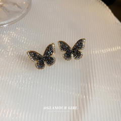 Black rhinestone setting butterfly ear studs