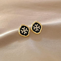 Korean fashion 925 needle black white ear studs