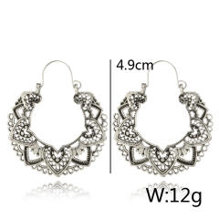 Vintage hollow Totem hoop earrings