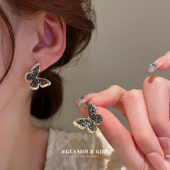 Black rhinestone setting butterfly ear studs
