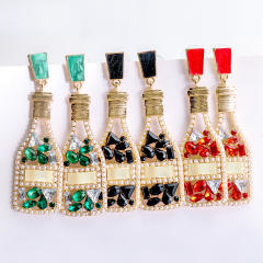 Champagne wine bottle full of rhinestone dangle earrings