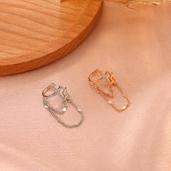 Diamond cross tassel ear cuff