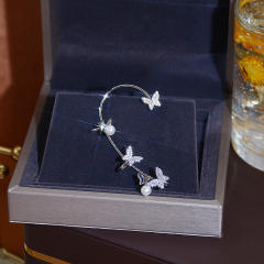 Delicate pave setting butterfly ear wrap