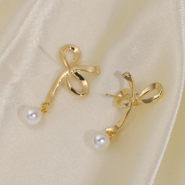 Hollow bow pearl bead clip on earrings drop earrings