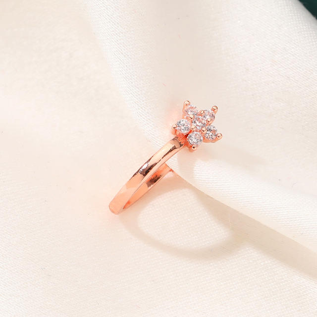 Tiny diamond flower ear cuff