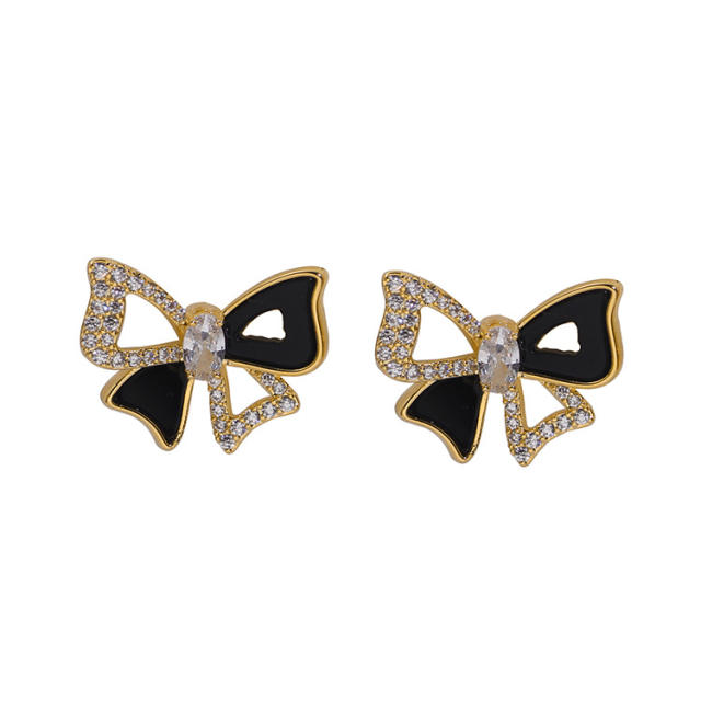 Diamond bow hollow out clip on earrings