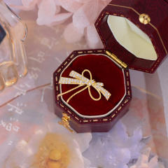 Diamond bow clip on earrings