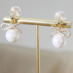 Diamond bow pearl clip on earrings drop earrings