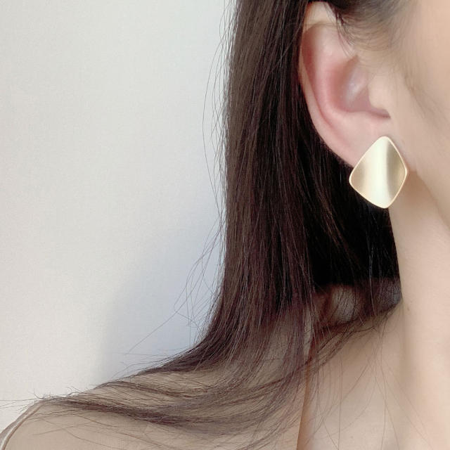 Matte gold color clip on earrings