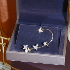 Delicate pave setting butterfly ear wrap