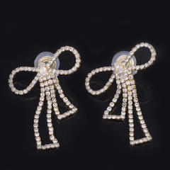 Diamond bow hollow clip on earrings