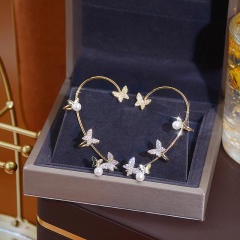 Delicate pave setting butterfly ear wrap