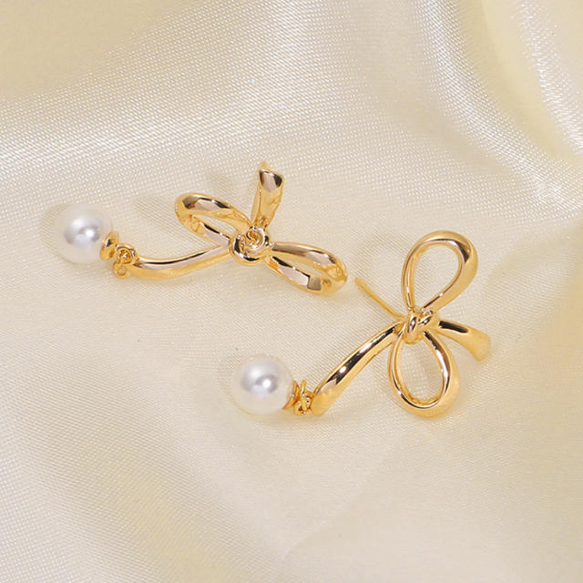 Hollow bow pearl bead clip on earrings drop earrings