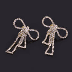 Diamond bow hollow clip on earrings