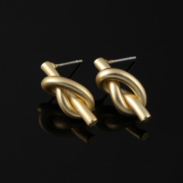 Matte knot clip on earrings
