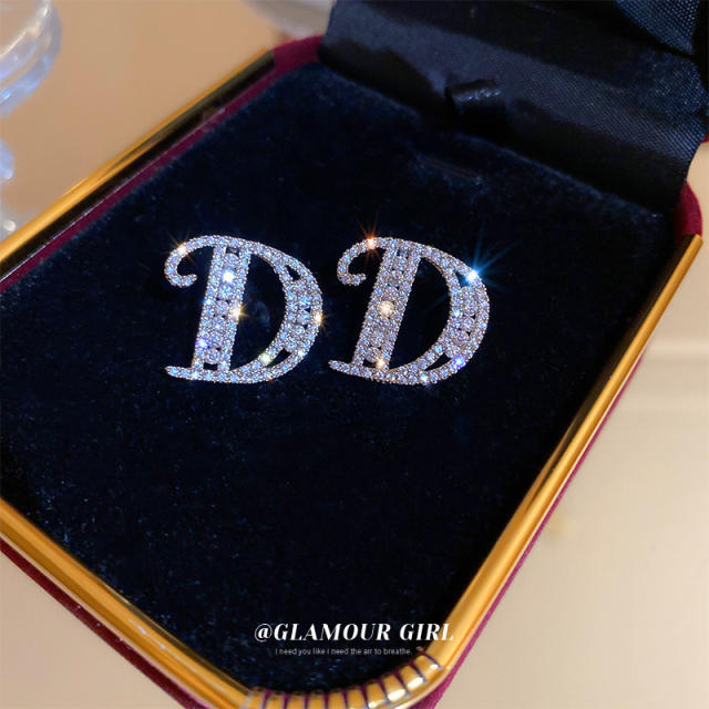 Silver needle diamond letter D ear studs