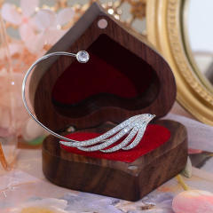 Diamond feather ear wrap