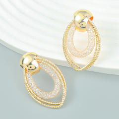 INS geometric oval shape ear studs
