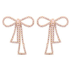 Diamond bow hollow clip on earrings