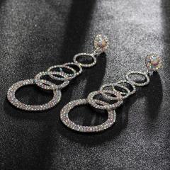 Rhinestone setting ring to ring long earrings