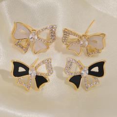 Diamond bow hollow out clip on earrings