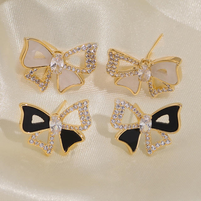 Diamond bow hollow out clip on earrings