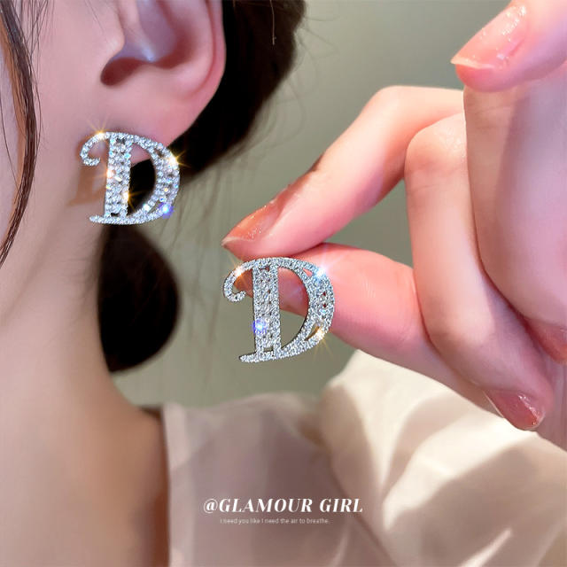 Silver needle diamond letter D ear studs