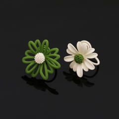 Daisy flower asymmetric clip on earrings