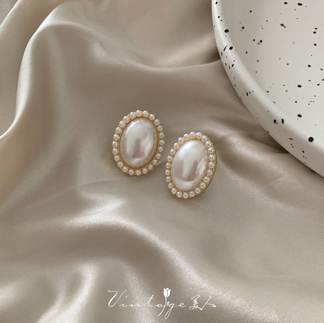 Oval shape pearl beaded clip on earrings