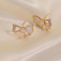 Diamond bow hollow out clip on earrings