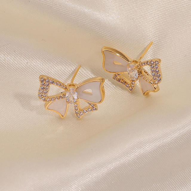 Diamond bow hollow out clip on earrings