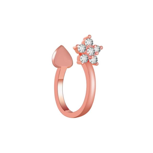 Tiny diamond flower ear cuff