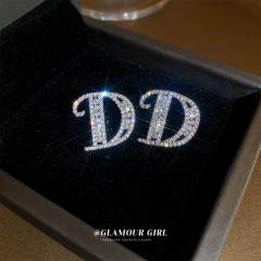 Silver needle diamond letter D ear studs