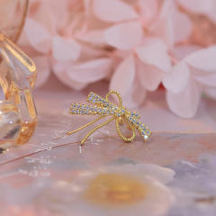 Diamond bow clip on earrings