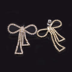 Diamond bow hollow clip on earrings
