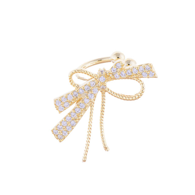 Diamond bow clip on earrings