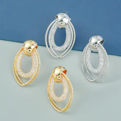 INS geometric oval shape ear studs