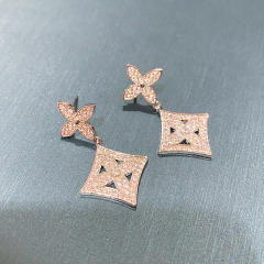 French elegant hollow clover diamond earrings