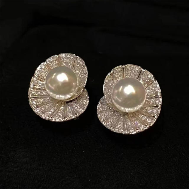 Elegant diamond shell shape pearl studs earrings