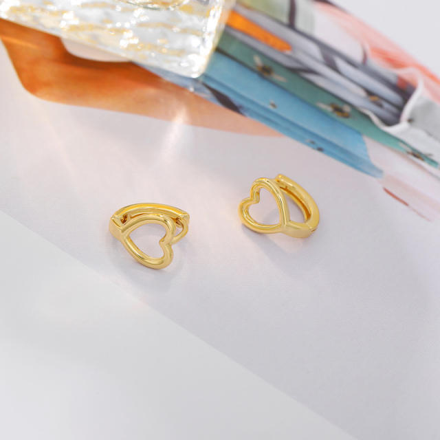 Hot sale hollow heart gold color huggie earrings