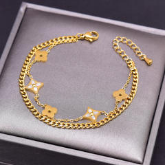 Fashionable hollow clover stainless steel bracelet