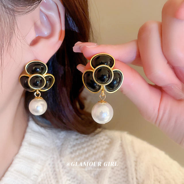 Black color camellia pearl earrings