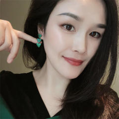Pave setting dark green rhinestone heart earrings